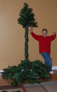 Photo of kids building a fake Christmas tree