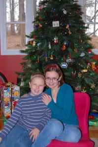 Photo of kids with Christmas tree